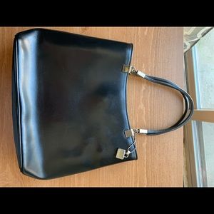 Woman’s black purse